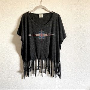 Free loader tribal print and fringe top